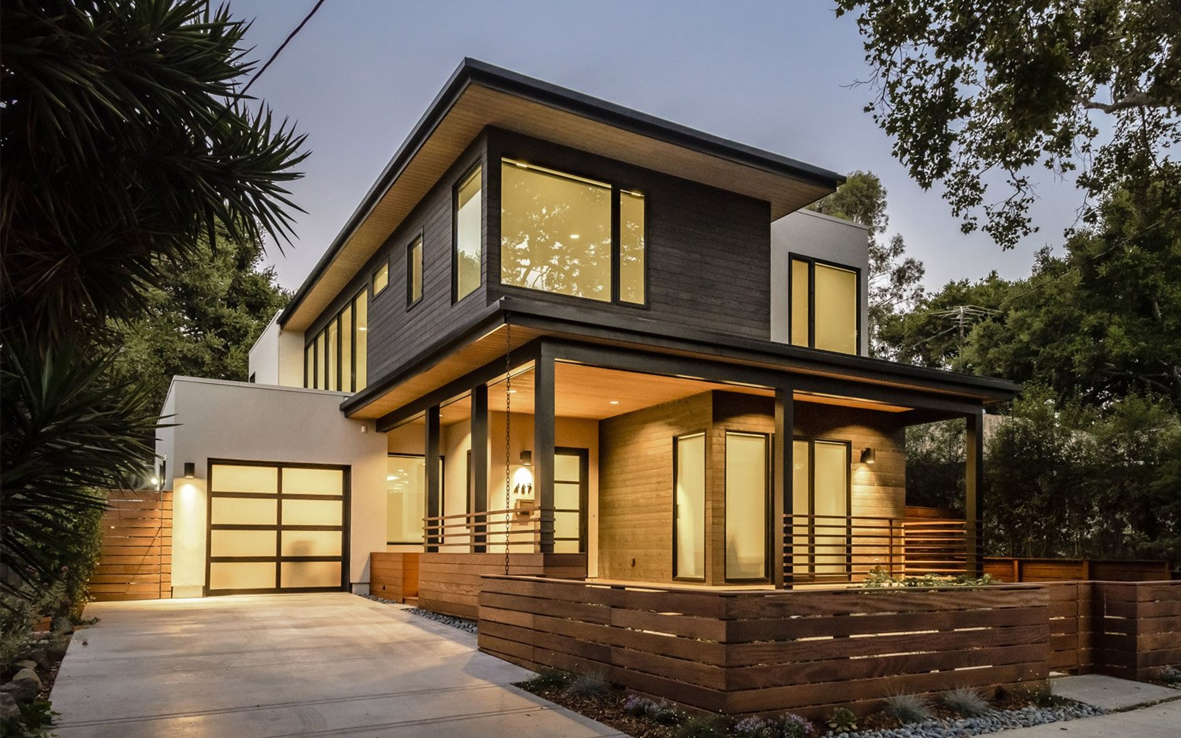 Illustrative reference of a welcoming prefab home at dusk