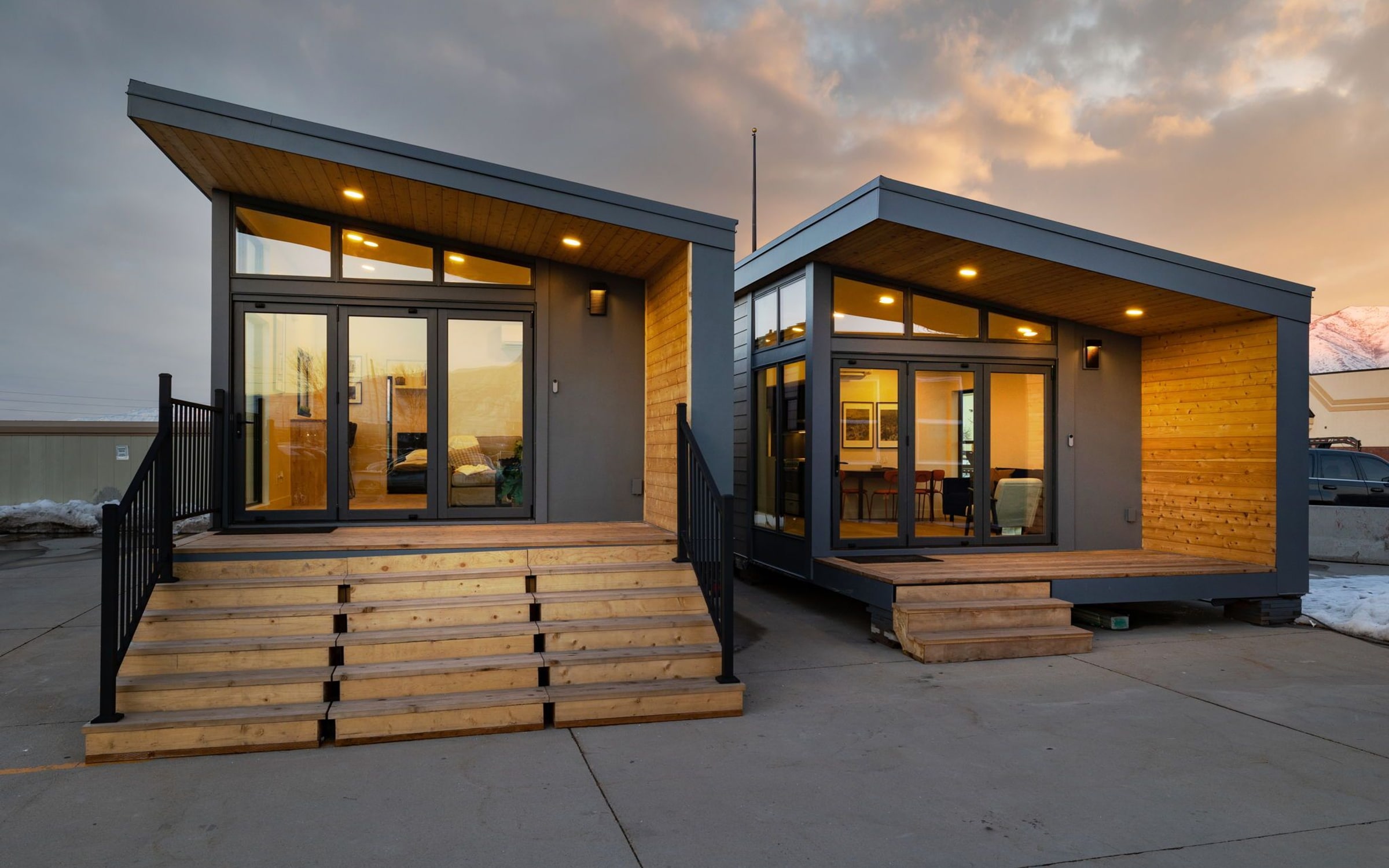 Illustrative reference of a contemporary prefab residence at dusk